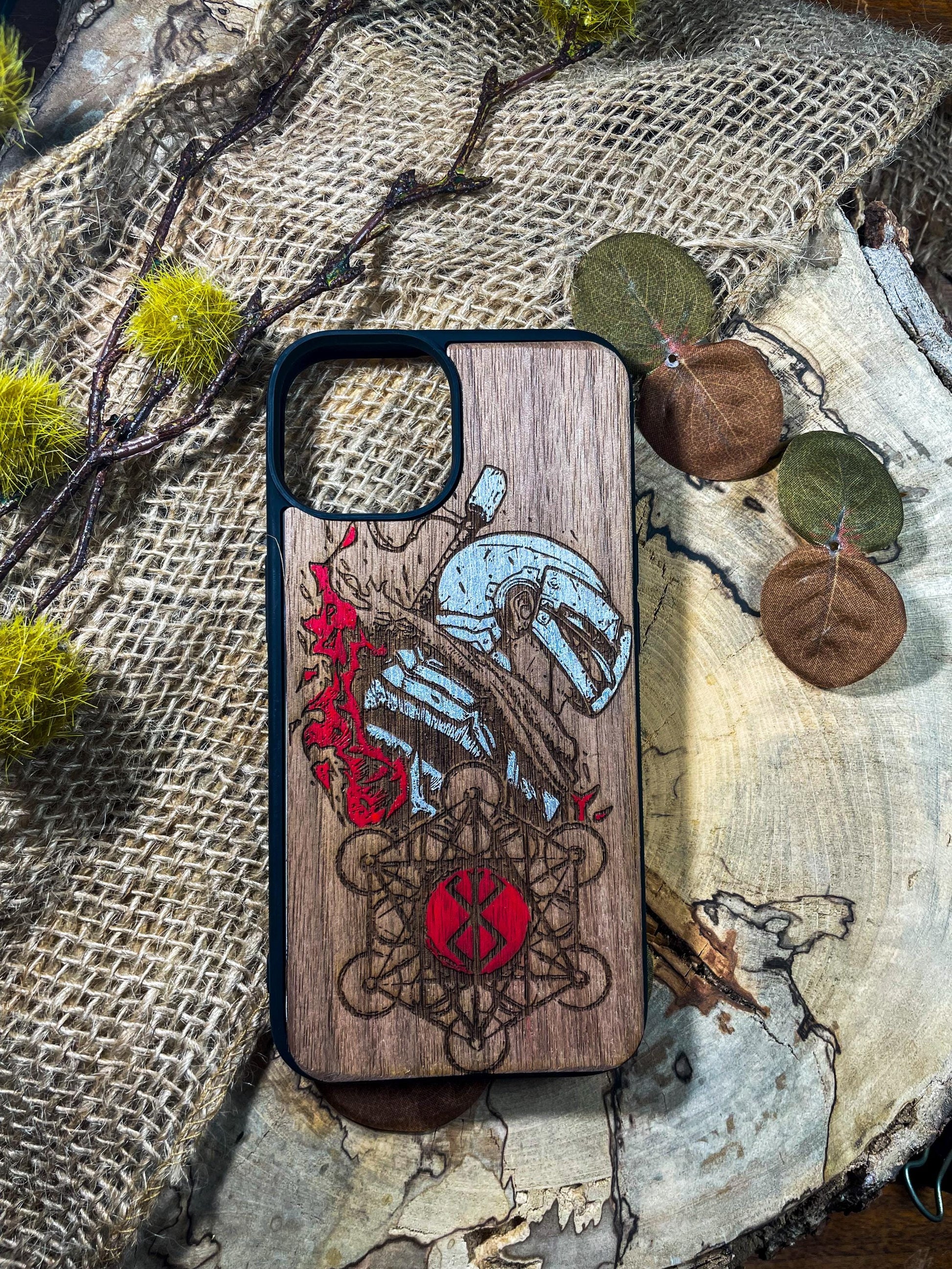 a wooden phone case with a picture of a man on it