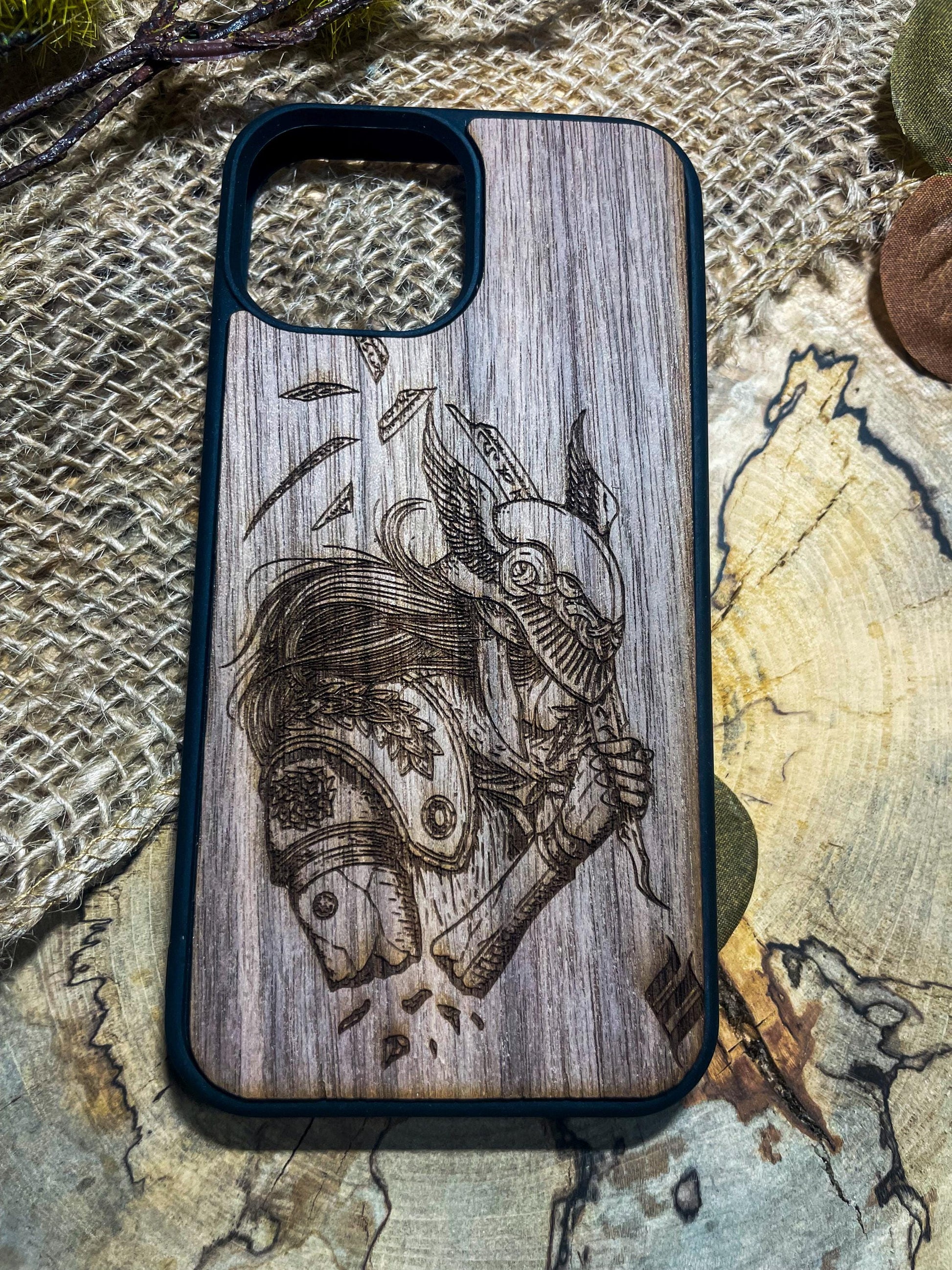 a wooden phone case with a picture of a man on it