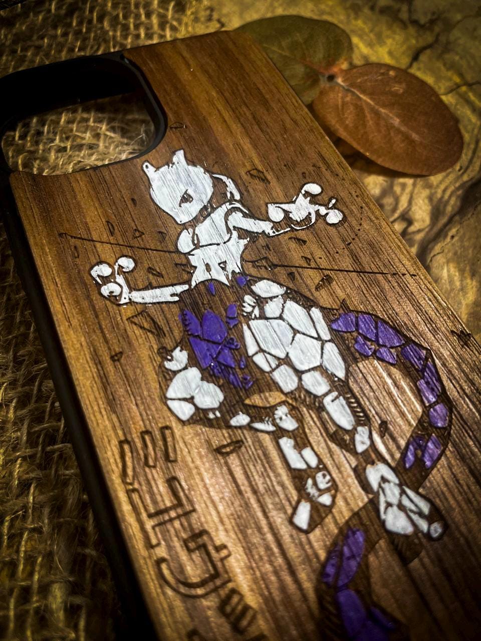 a wooden phone case with a picture of a cartoon character on it