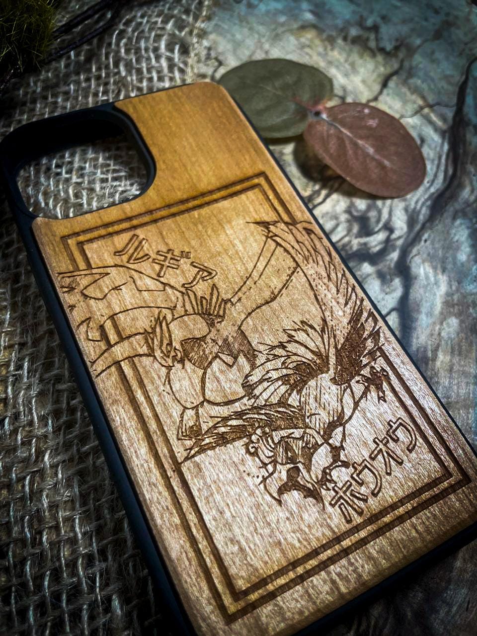 a wooden phone case with a picture of a man holding a sword