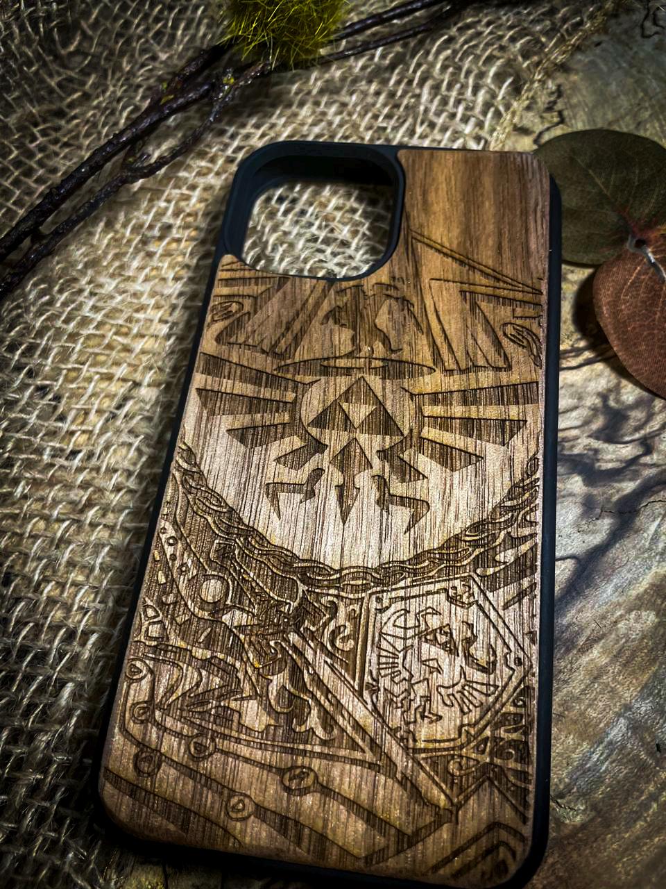 a wooden phone case with a picture of a bird on it