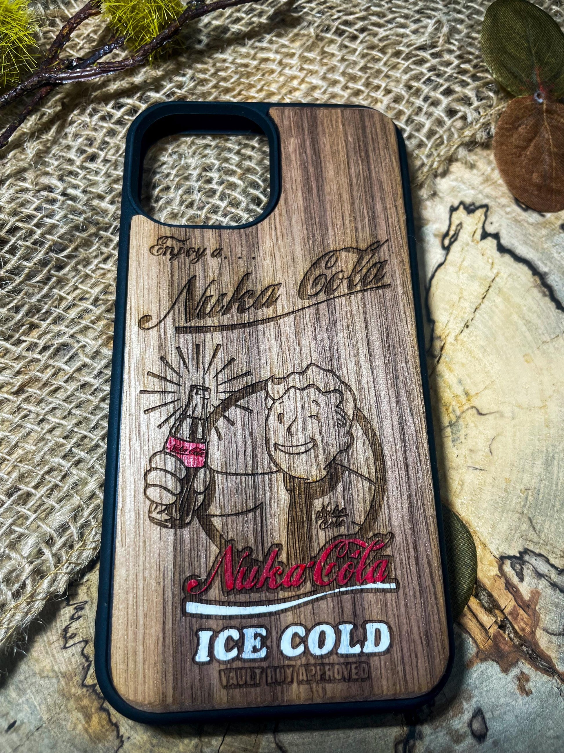 a wooden phone case with a picture of a cartoon character on it