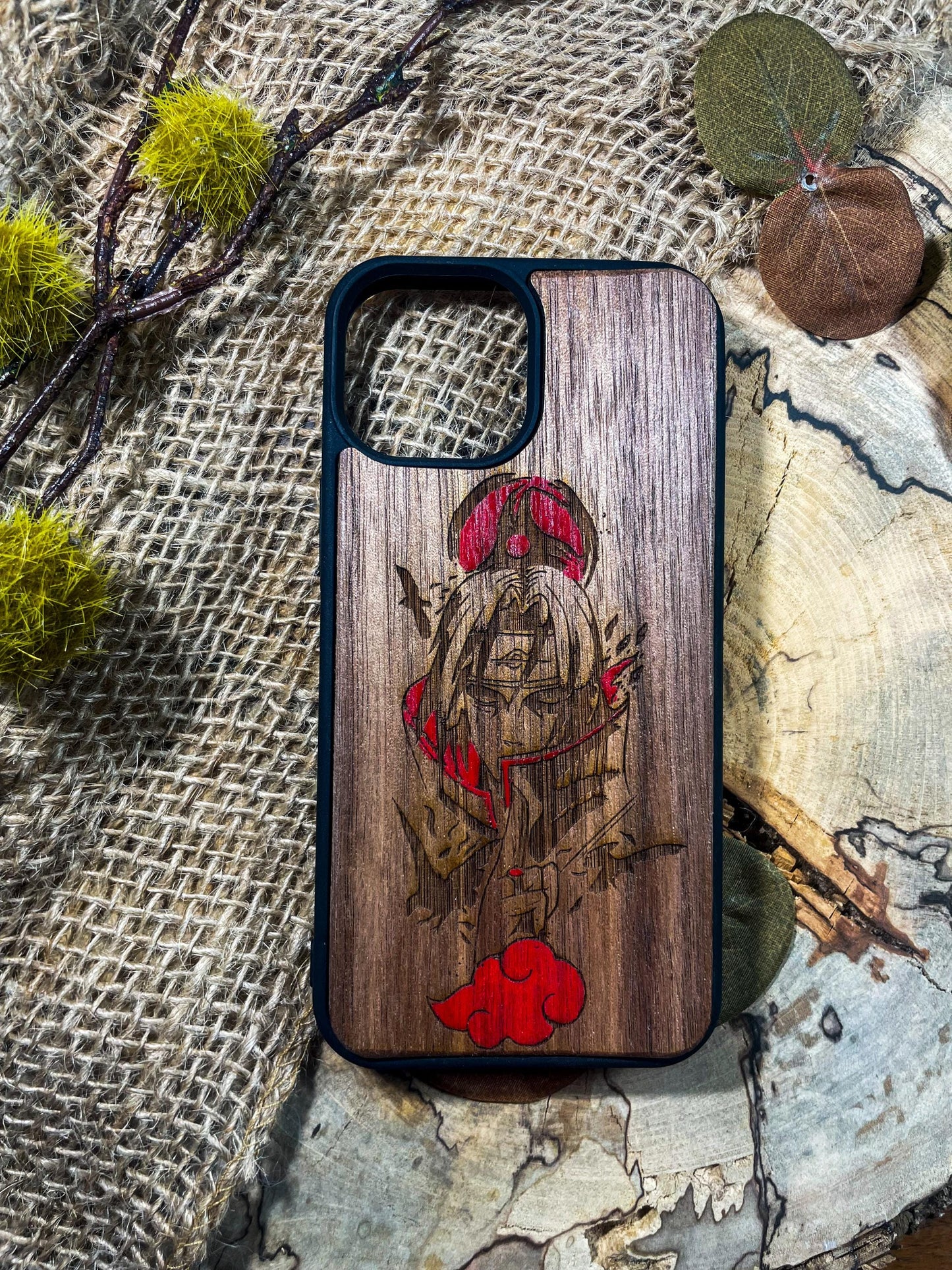 a wooden phone case with a picture of a person on it