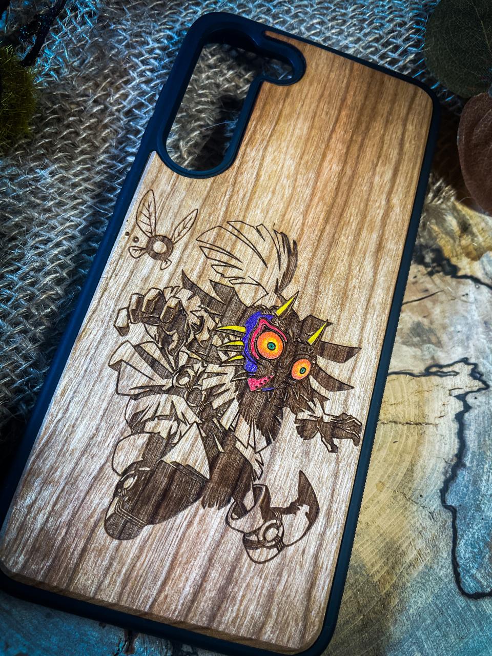 a wooden phone case with a picture of a cartoon character on it