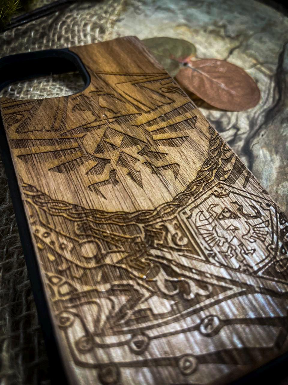 a wooden cutting board with a design on it