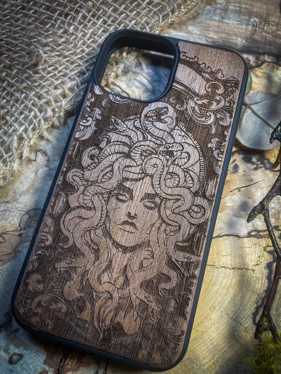 a wooden phone case with a picture of a woman&#39;s face