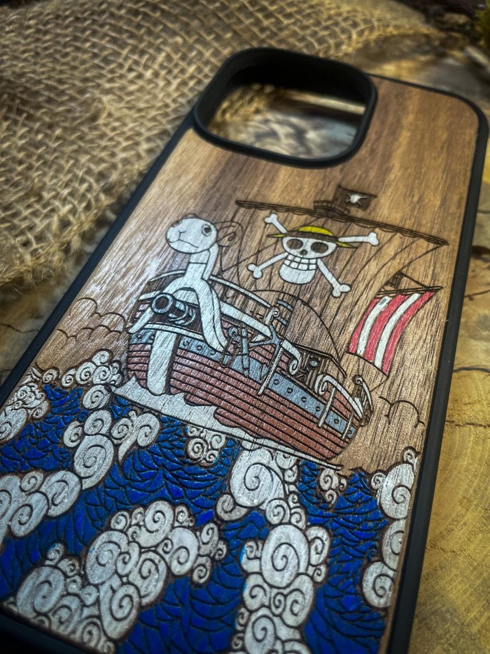 a phone case with a picture of a pirate ship