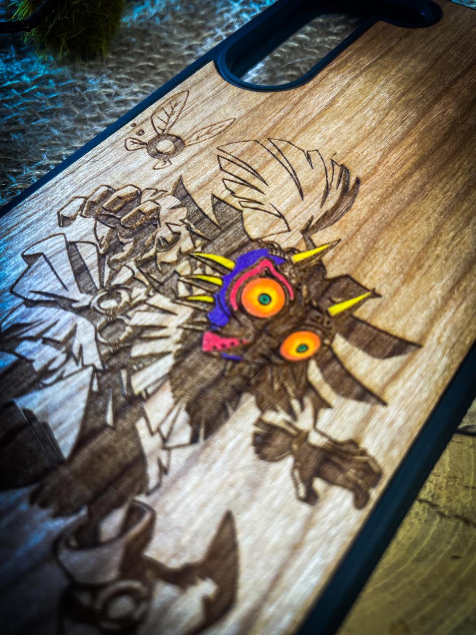 a wooden cutting board with a design on it