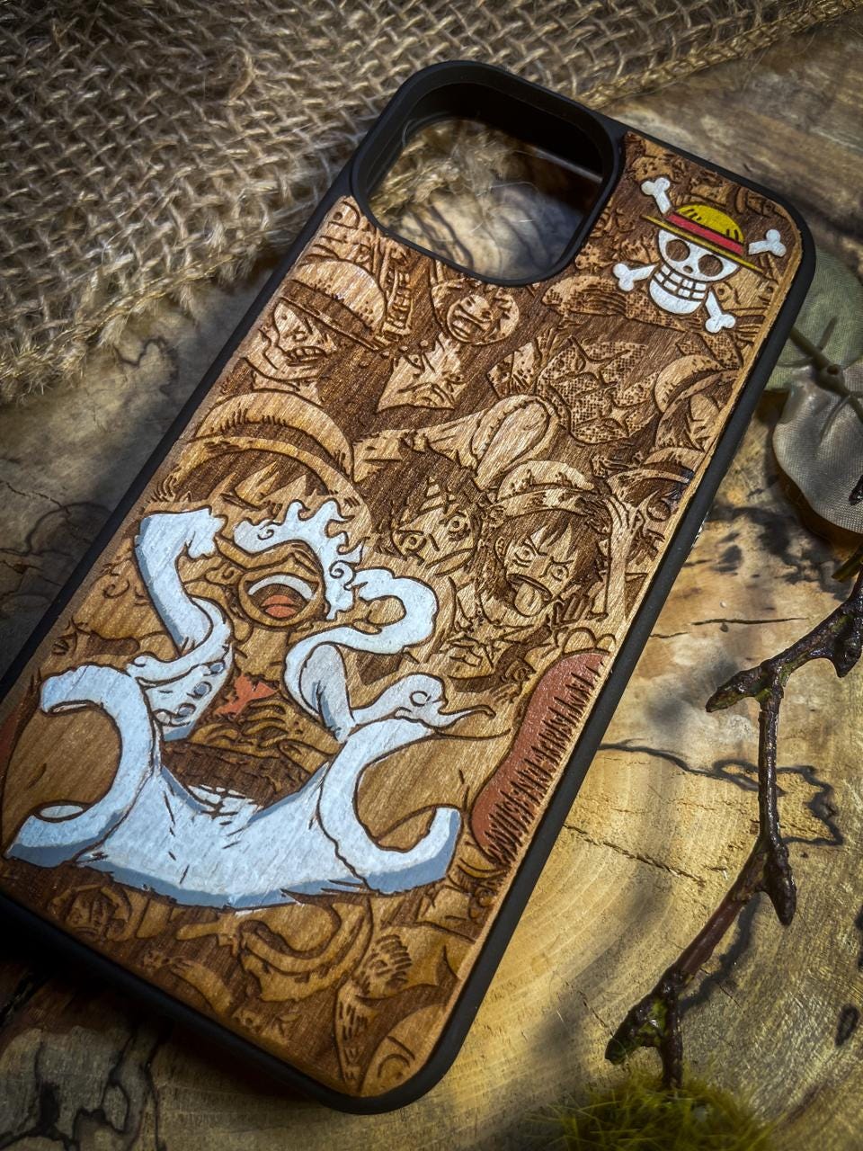 a wooden phone case with a painting on it