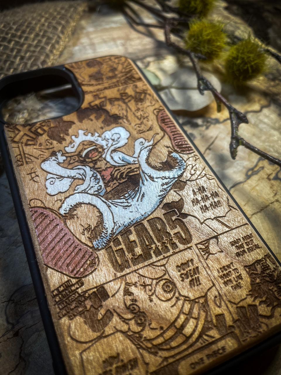 a wooden phone case with a picture of a dragon on it